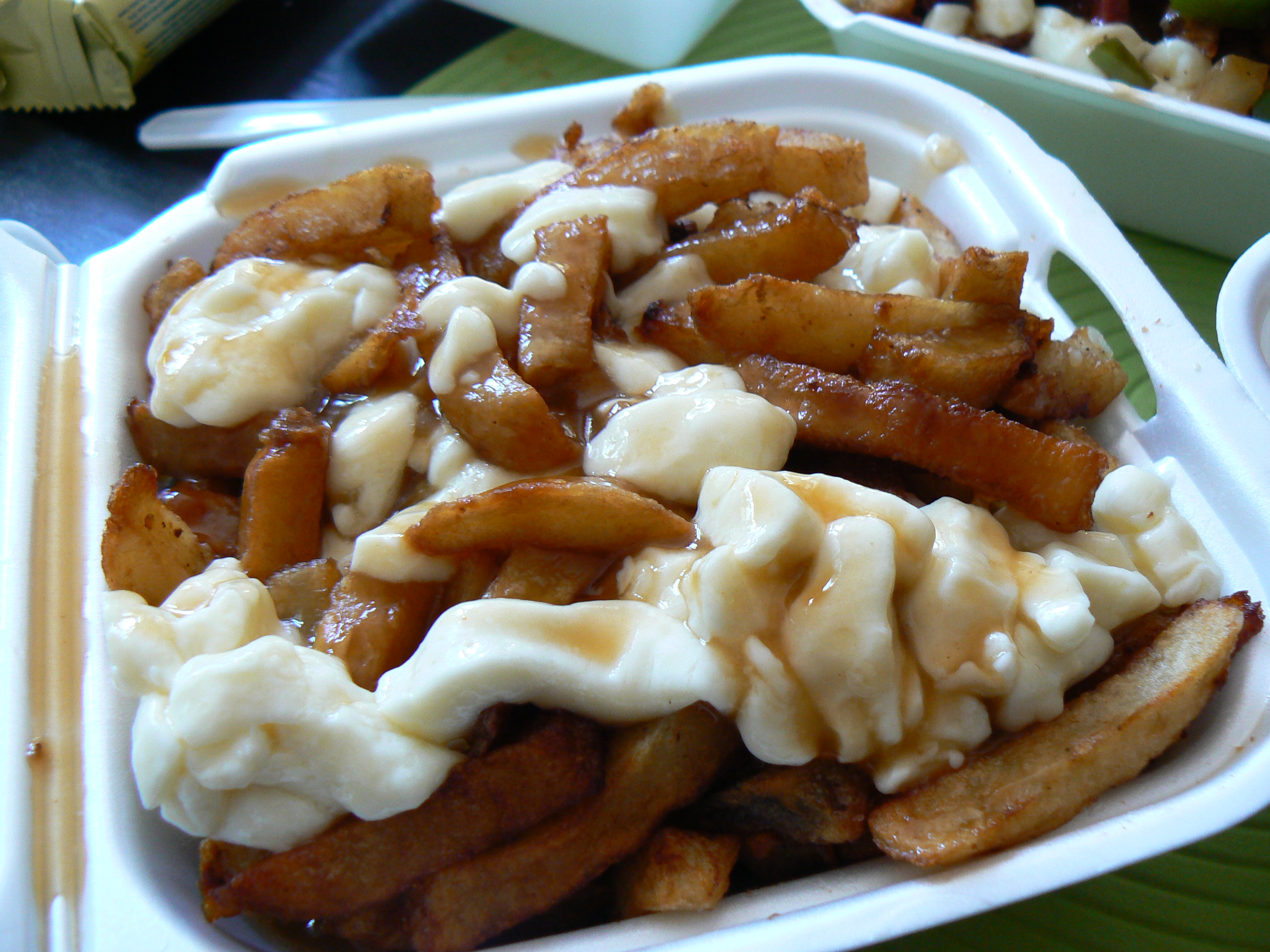 What Is Poutine Canadian Gravy Fries With Cheese Curds 